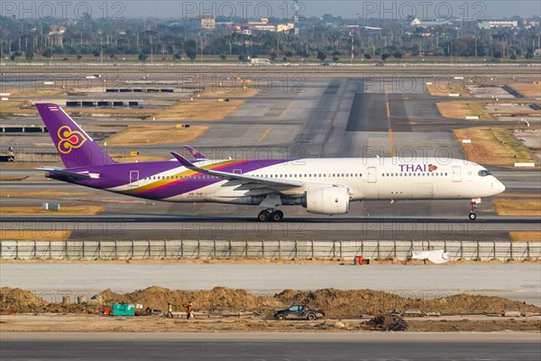 A Thai Airways Airbus A350-900 aircraft with registration HS-THF at Bangkok Suvarnabhumi Airport