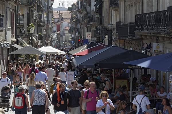 Pedestrian street Rua das Flores with crowds of tourists