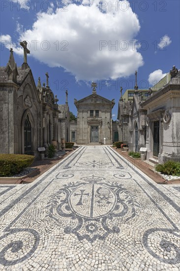 Artistic stone pavement calcada portugesa in the section of the religious order Ordem da Trindade