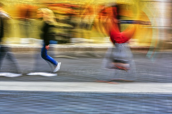 Colourful clown beats a wheel