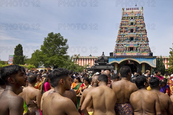 Hindus on the main festival day at the temple festival in front of the Hindu temple Sri Kamadchi Ampal