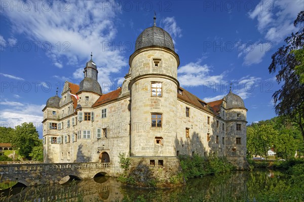 North-west side of Mitwitz moated castle with stone bridge and entrance portal