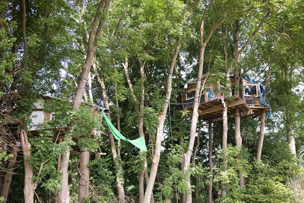 Tree houses on the edge of the Garzweiler opencast lignite mine