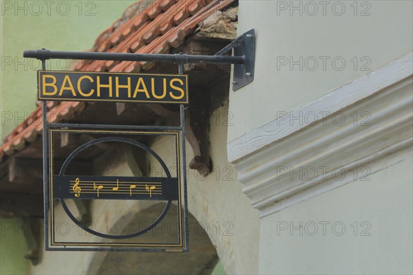 Nose plate with musical notes and inscription Bachhaus