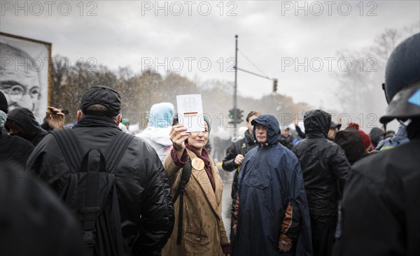 Demonstrators protest against the reform of the infection protection law