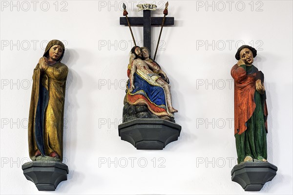 Pieta and two figures of saints