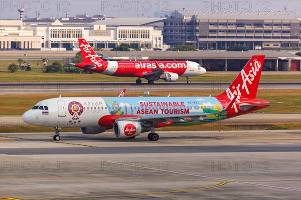 A Thai AirAsia Airbus A320 aircraft with registration HS-BBJ and Sustainable ASEAN Tourism special livery at Bangkok Don Mueang Airport