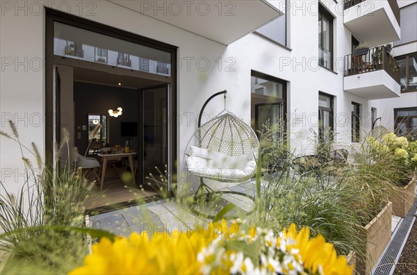 Hanging swing on the terrace of a luxury flat in Berlin