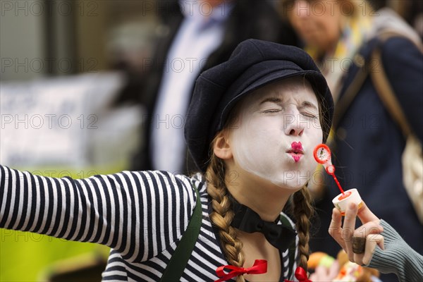 Clown making soap bubbles