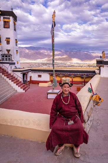 Elderly man in traditional Ladakhi clothes