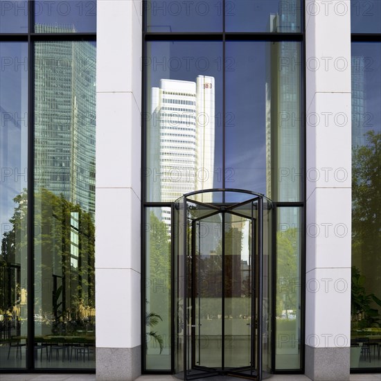 Reflection of the skyscrapers at the entrance to the Taunus Tower