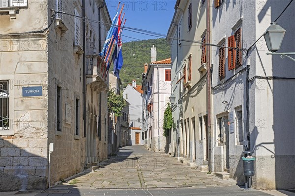 Alley with old houses in the historic centre of the town Cres on the island Cherso