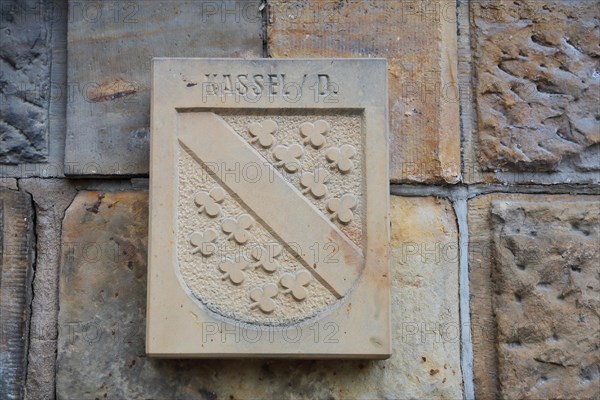 City coat of arms of Kassel from stone at the Bach Church