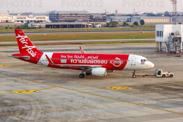 A Thai AirAsia Airbus A320 aircraft with registration HS-BBH and the Now Everyone Can Fly Responsibly special livery at Bangkok Don Mueang Airport