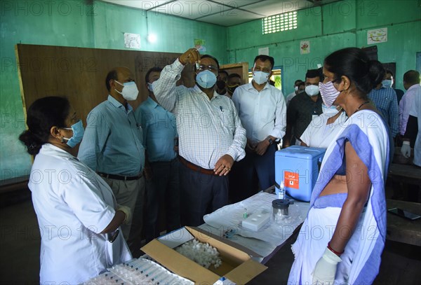 Assam Health Minister Keshab Mahanta along with others visits a vaccination centre at Chandrapur in Kamrup district of Assam
