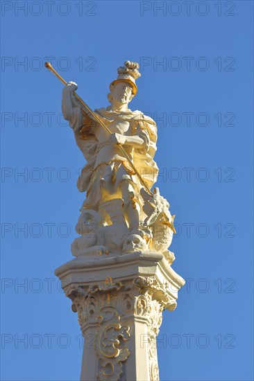 Statue of St. George with lance fighting dragons at St. George's Fountain