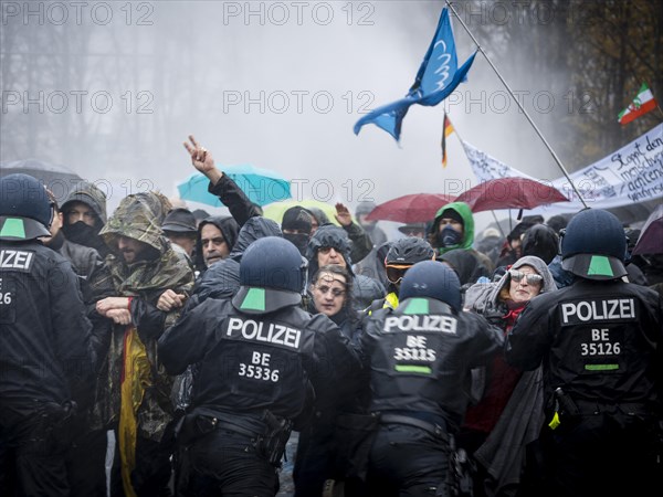 Demonstrators protest against the reform of the infection protection law