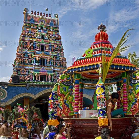 Hindus on the main festival day at the temple festival in front of the Hindu temple Sri Kamadchi Ampal