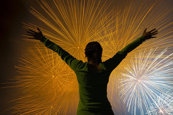 Woman with arms outstretched