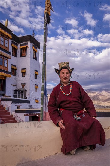 Elderly man in traditional Ladakhi clothes