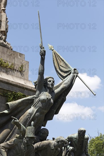 Woman with raised sword and flag