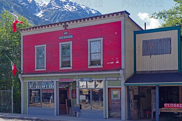 Old wooden houses from the pioneer era in the main street of the village of Stewart