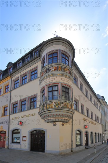 Pharmacy and oriel with decorations