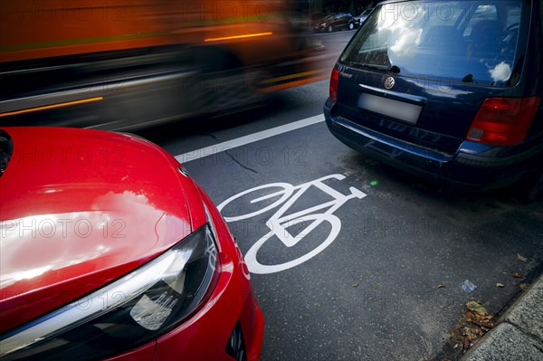 Cars park on a cycle path in Ollenhauerstrasse in Berlin Reinickendorf. The new transport administration in Berlin has stopped several cycle path projects in Berlin. Berlin