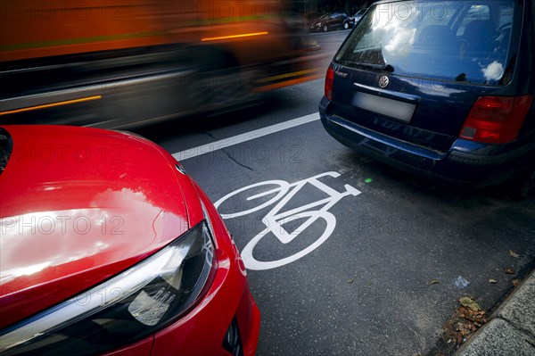 Cars park on a cycle path in Ollenhauerstrasse in Berlin Reinickendorf. The new transport administration in Berlin has stopped several cycle path projects in Berlin. Berlin