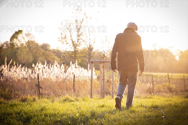 Man goes for an autumn walk alone