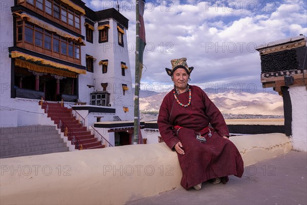 Elderly man in traditional Ladakhi clothes