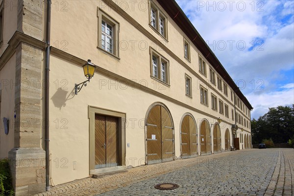 Historic tithe barn built in 1699 in Muennerstadt