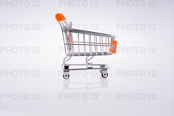 Hand holding a Cart on a white background