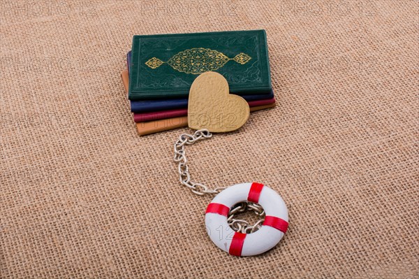 Little books attached to a life saver with a chain