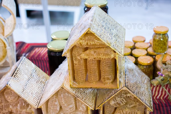 Sweet fresh honey in the sealed comb frame