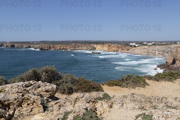 Cliffs overlooking the surf at the surfing beach Praia do Tonel
