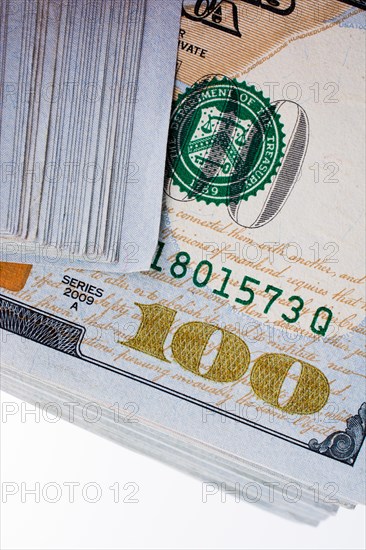 American 100 dollar banknotes made of paper placed on white background