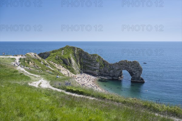 Walk along the chalk coast with the famous rock bridge Durdledoor