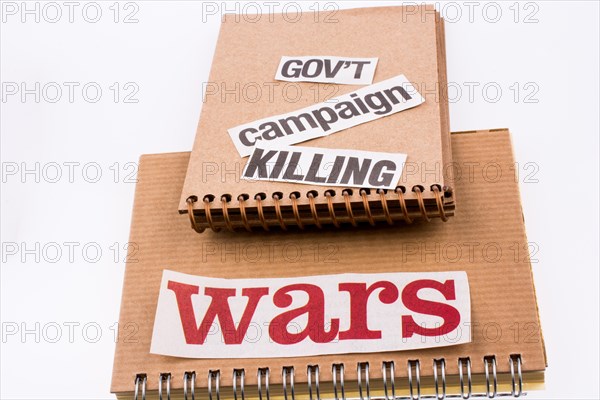 Torn Newspaper Title on a notebook