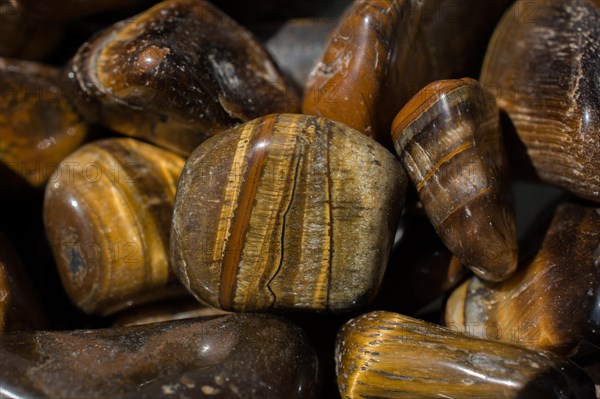 Tiger's eye and hawk's eye gemstone as natural mineral rock specimen