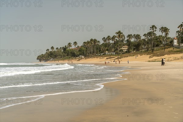 Tourists on the beach of Fajara