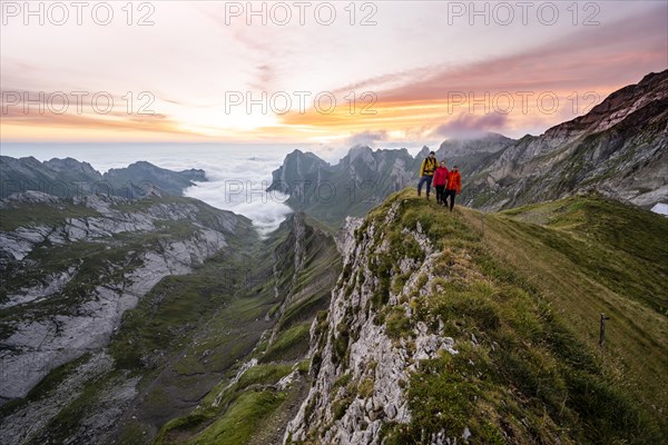 View over Saentis mountains into the valley of Meglisalp at sunrise