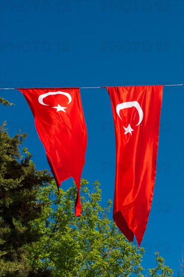 Turkish national flag hang in view in open air