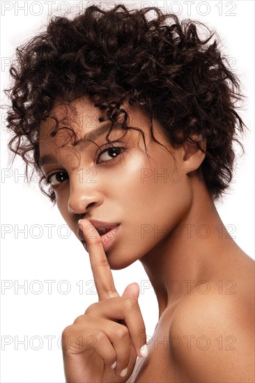 African American skincare models with perfect skin and curly hair. Beauty spa treatment concept