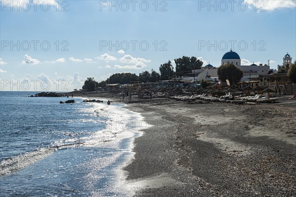 Black lava beach in Perissa