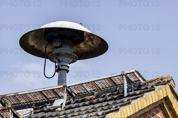 Siren on a roof