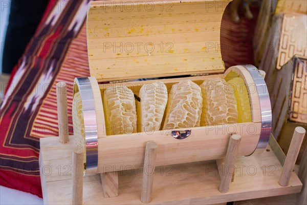 Sweet fresh honey in the sealed comb frame