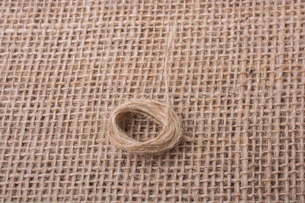 Roll of brown color linen string paper background