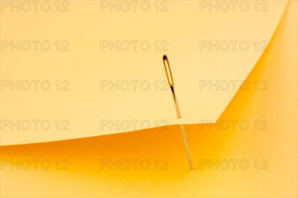 Needle pierced yellow color note paper