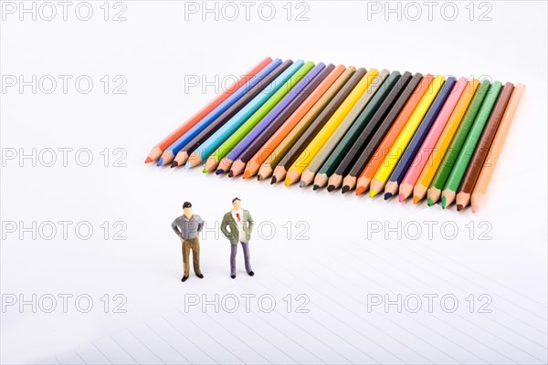 Two figurine standing by pen